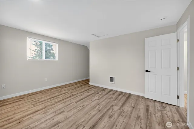 a kitchen with stainless steel appliances granite countertop a refrigerator a stove top oven a sink and dishwasher