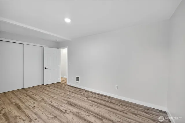 a bathroom with a double vanity sink toilet and shower