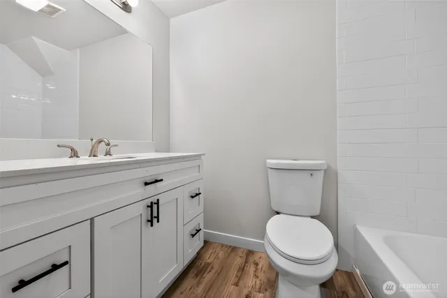 a view of a bedroom from the hallway