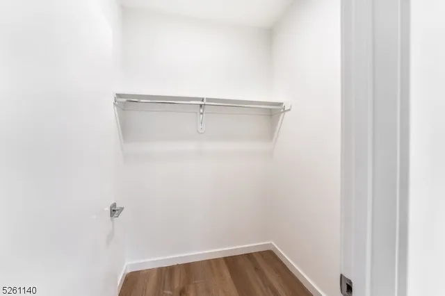 a front view of a building with parking space