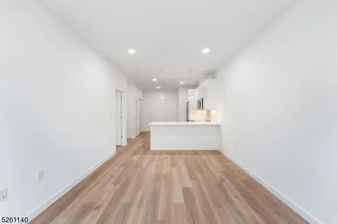 a living room with furniture and windows