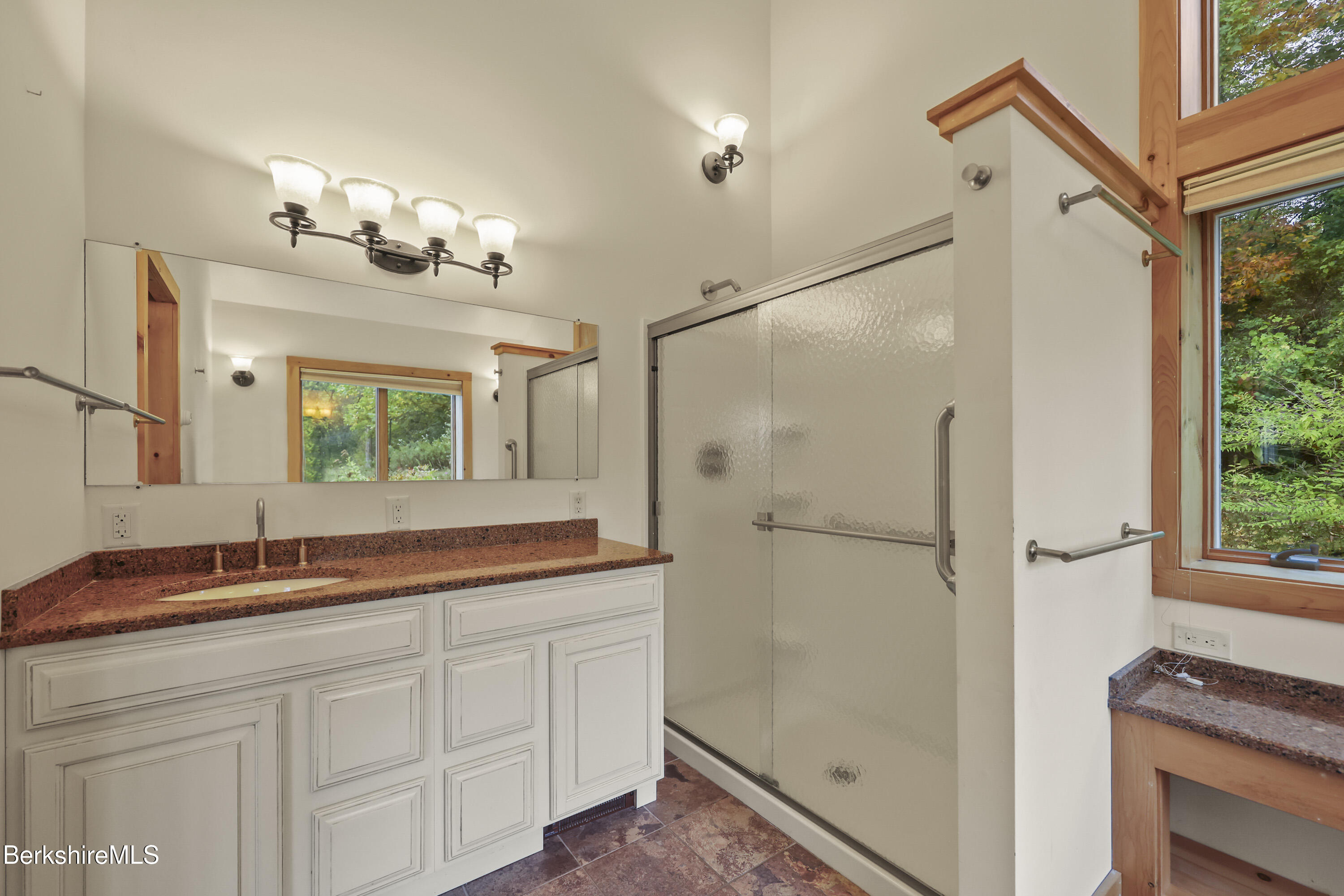 1030 Simonds Road Williamstown, MA 01267 - Photo 27 of 76 a bathroom with a sink and a mirror