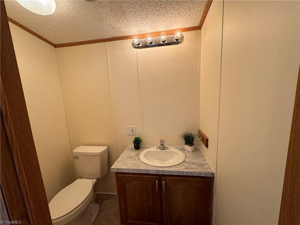 178 Waddell Street Ronda, NC 28670 - Photo 25 of 47 Half Bath off laundry room