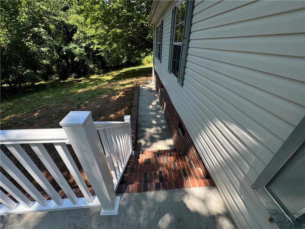 178 Waddell Street Ronda, NC 28670 - Photo 3 of 47 Go around back to enter the front door.