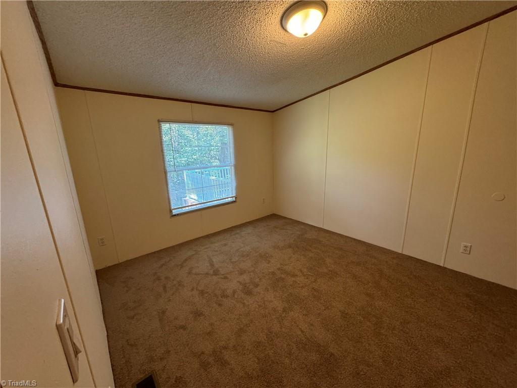 178 Waddell Street Ronda, NC 28670 - Photo 32 of 47 2nd bedroom closet view