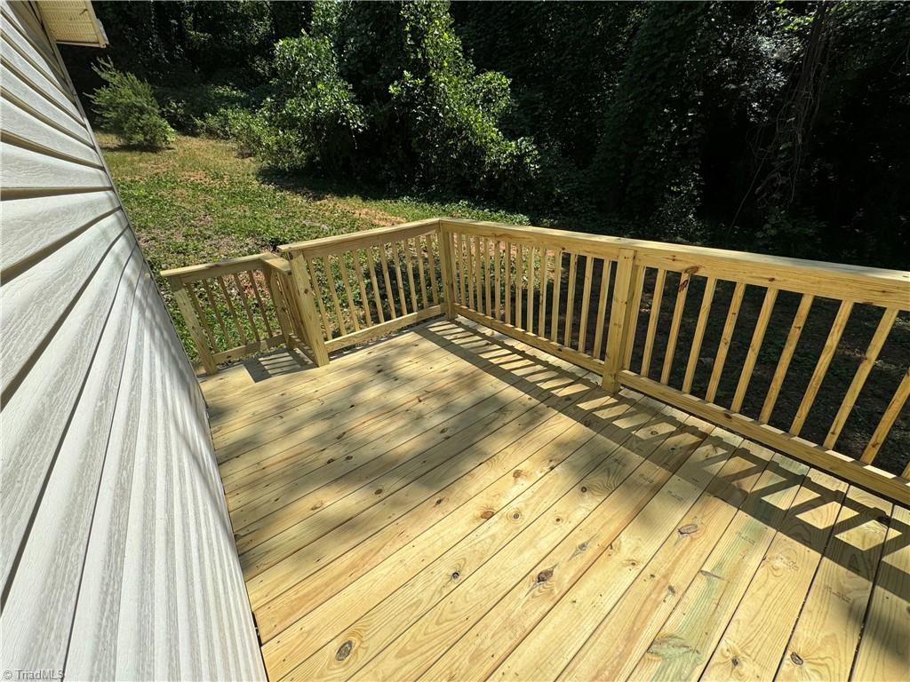 178 Waddell Street Ronda, NC 28670 - Photo 46 of 47 Side porch wraps around to back porch