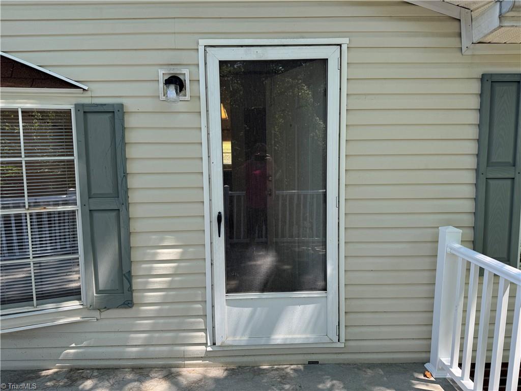178 Waddell Street Ronda, NC 28670 - Photo 5 of 47 Storm door on front porch.