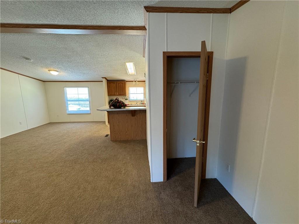 178 Waddell Street Ronda, NC 28670 - Photo 7 of 47 Coat closet right when you enter from the front door.