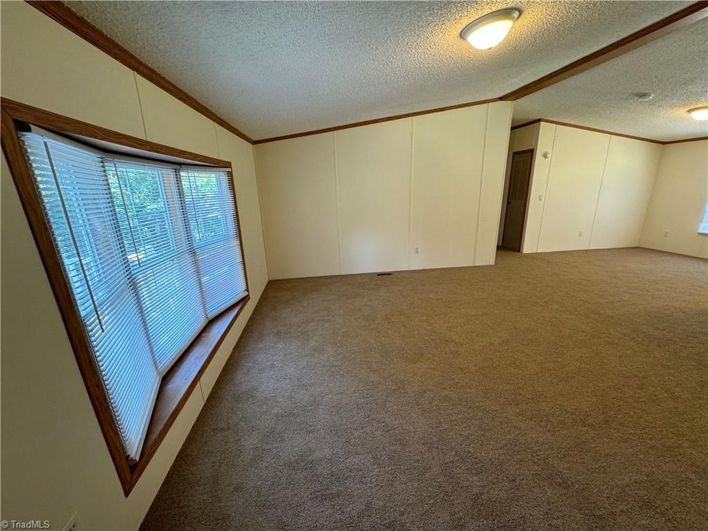 178 Waddell Street Ronda, NC 28670 - Photo 8 of 47 Living room has a beautiful bay window