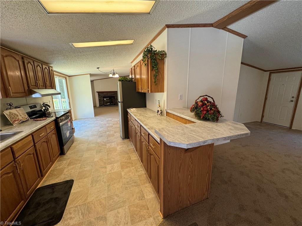 178 Waddell Street Ronda, NC 28670 - Photo 9 of 47 Extended countertop is perfect for a couple barstools!!