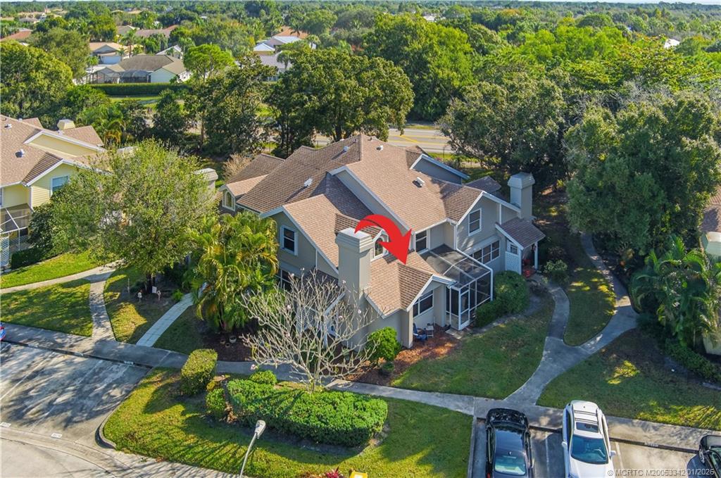 3584 Southwest Sunset Trace Circle Palm City, FL 34990 - Photo 27 of 32 an aerial view of a house