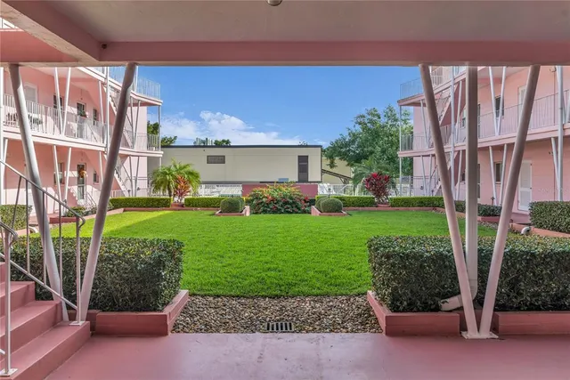 aerial view of a house with a yard