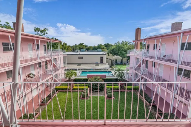 a view of street with parked cars
