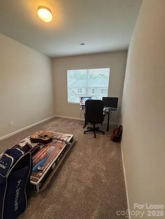 a room with furniture and window