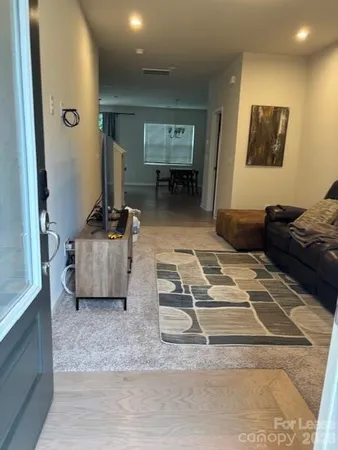 a living room with furniture and a couch