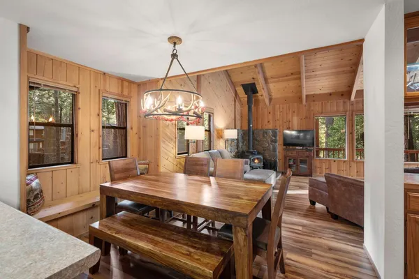 a living room with furniture a window and a fireplace