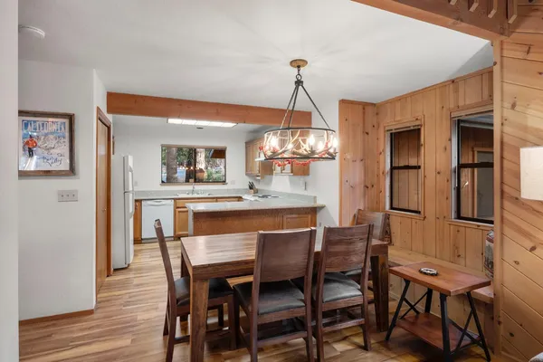 a living room with furniture or couch and a wooden floor