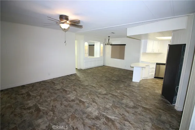 a view of a room with a hallway