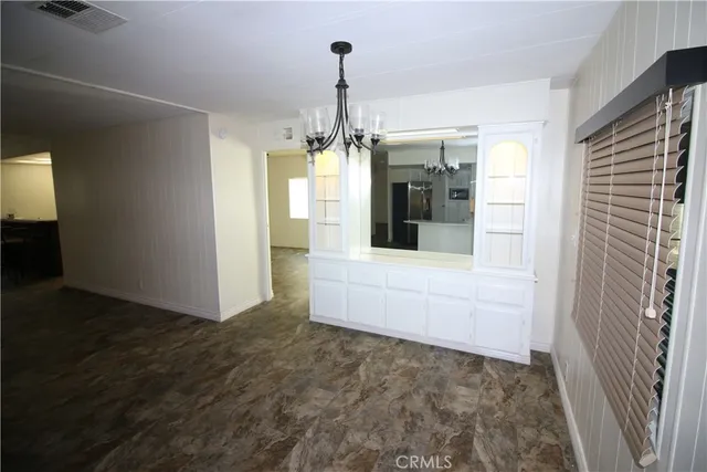 a kitchen with stainless steel appliances a refrigerator stove and sink