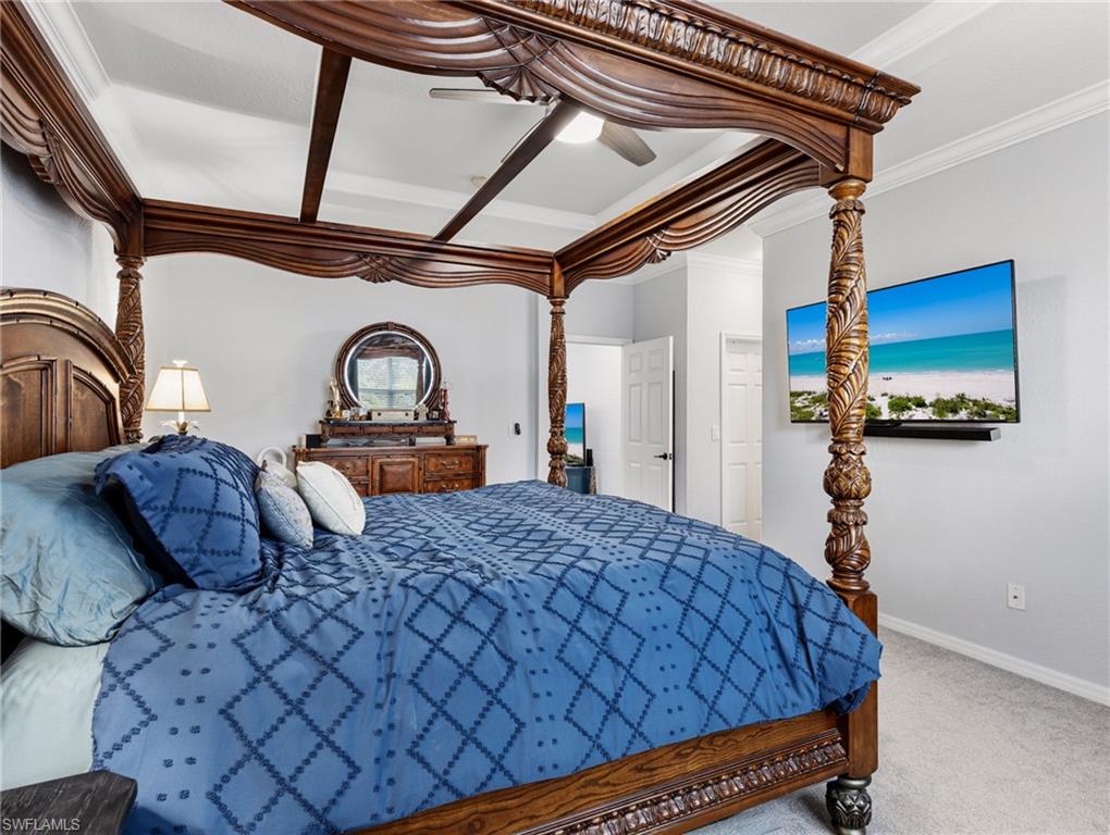 20334 Larino Loop Estero, FL 33928 - Photo 26 of 39 a bedroom with bed and a walk in closet