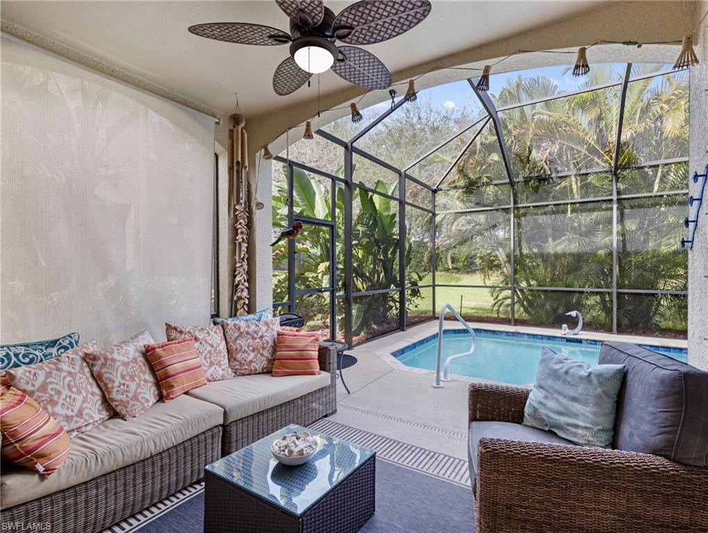 20334 Larino Loop Estero, FL 33928 - Photo 33 of 39 a living room with furniture and a large window