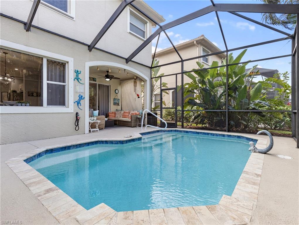 20334 Larino Loop Estero, FL 33928 - Photo 36 of 39 a view of a backyard with a swimming pool