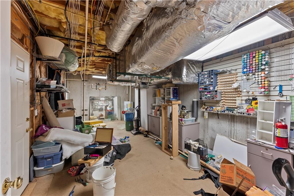 5478 Flakes Mill Road Ellenwood, GA 30294 - Photo 19 of 30 a room with gym equipment