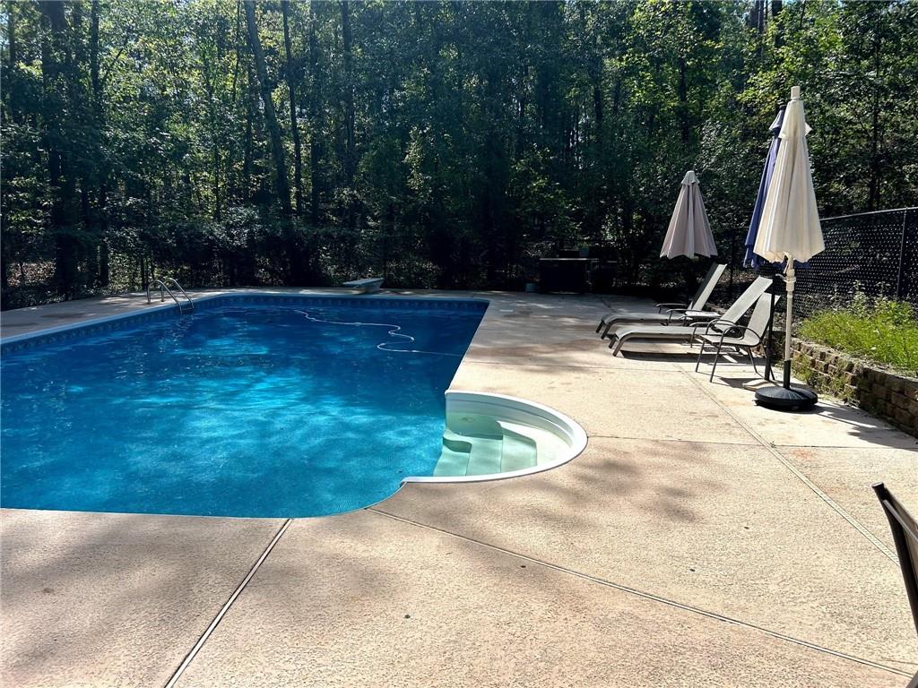 5478 Flakes Mill Road Ellenwood, GA 30294 - Photo 27 of 30 a view of a park with large trees