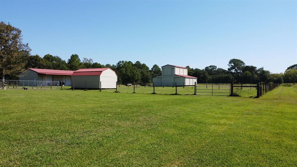 1655 Wooten Road Beaumont, TX 77707 - Photo 6 of 46 a front view of a house with garden