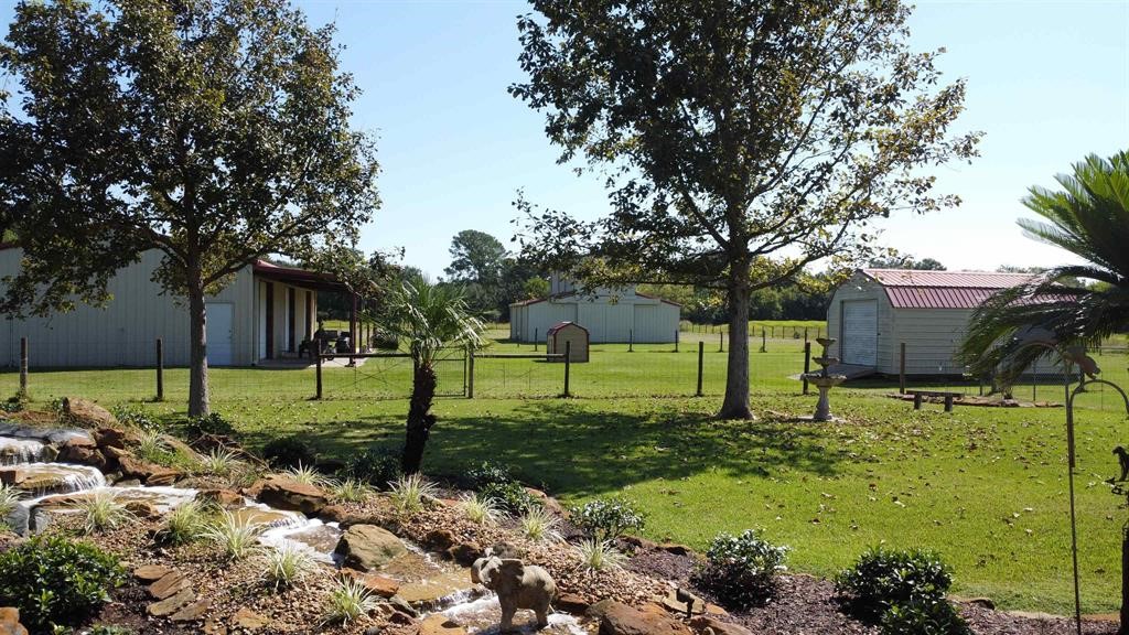 1655 Wooten Road Beaumont, TX 77707 - Photo 7 of 46 a view of a park with large trees