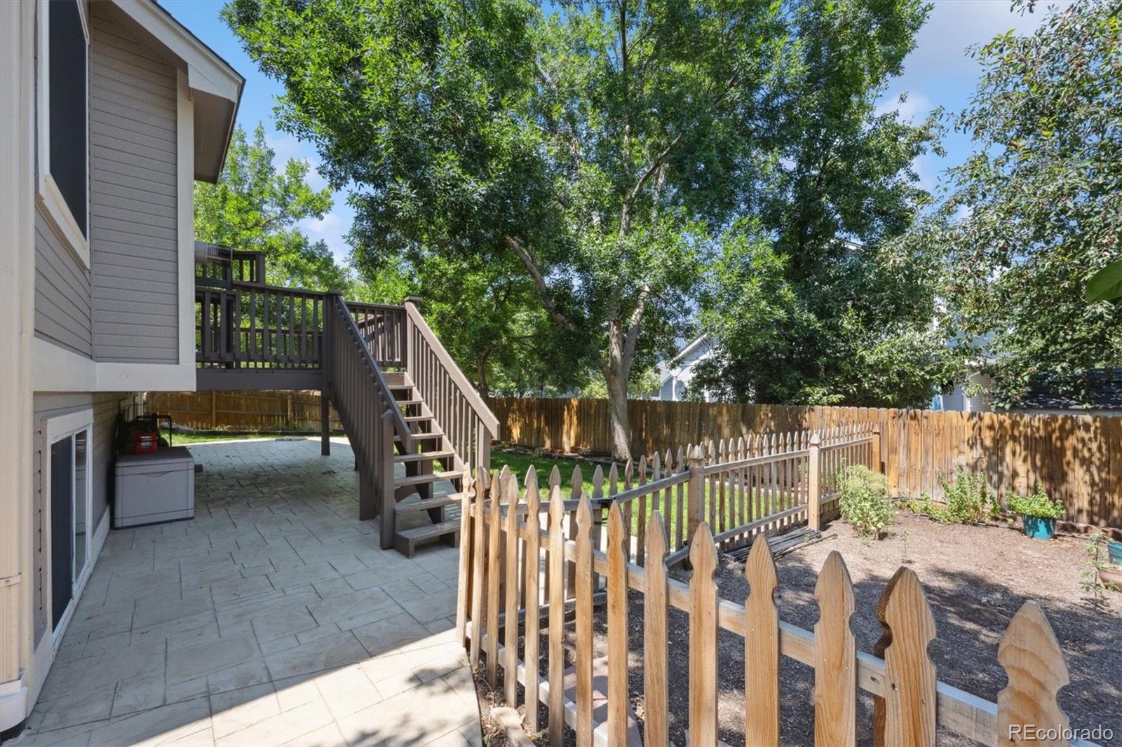 6715 West 97th Circle Westminster, CO 80021 - Photo 25 of 31 a view of deck and wooden floor