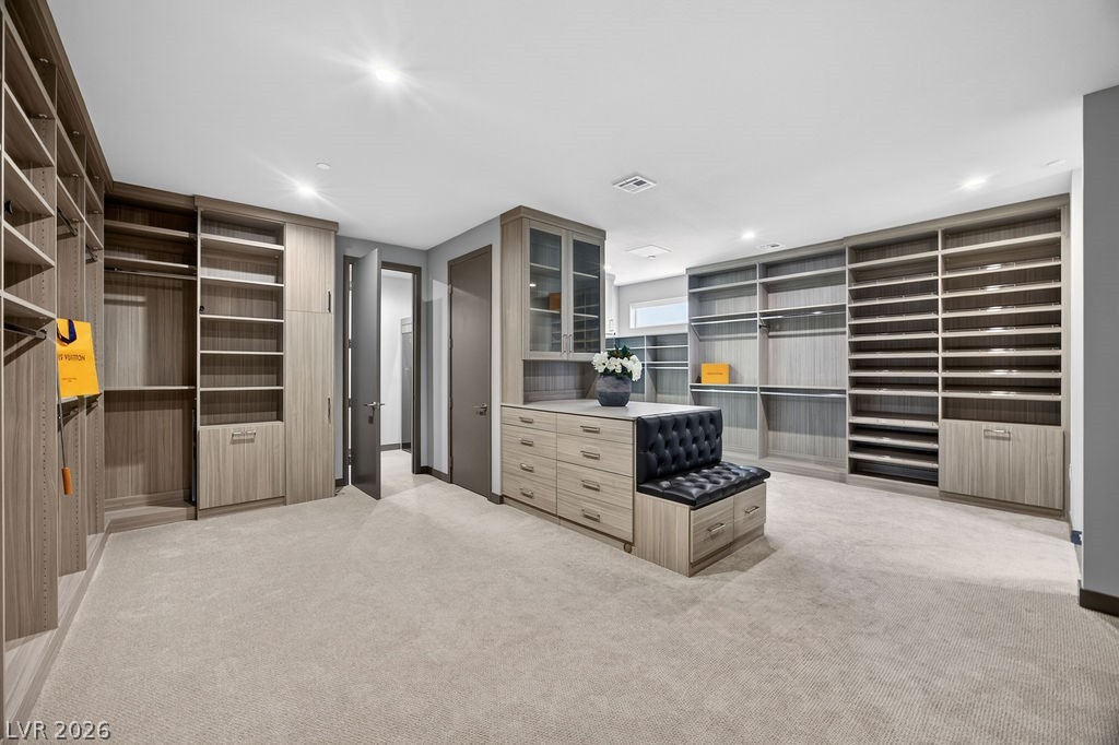 1456 Solitude Ridge Drive Henderson, NV 89012 - Photo 63 of 94 Primary Bedroom with Custom Closet and access to Secondary Laundry, Upstairs