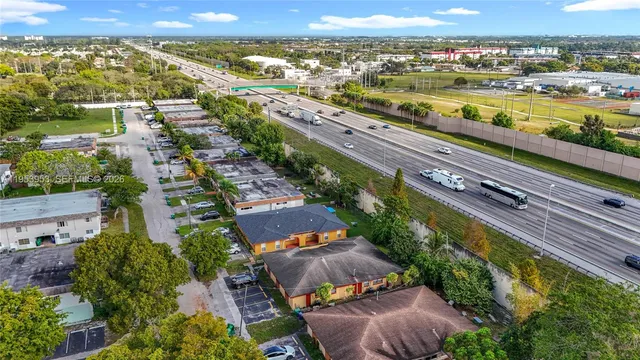 an aerial view of residential building and lake view