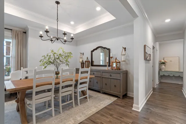 a view of kitchen with sink and wooden floor