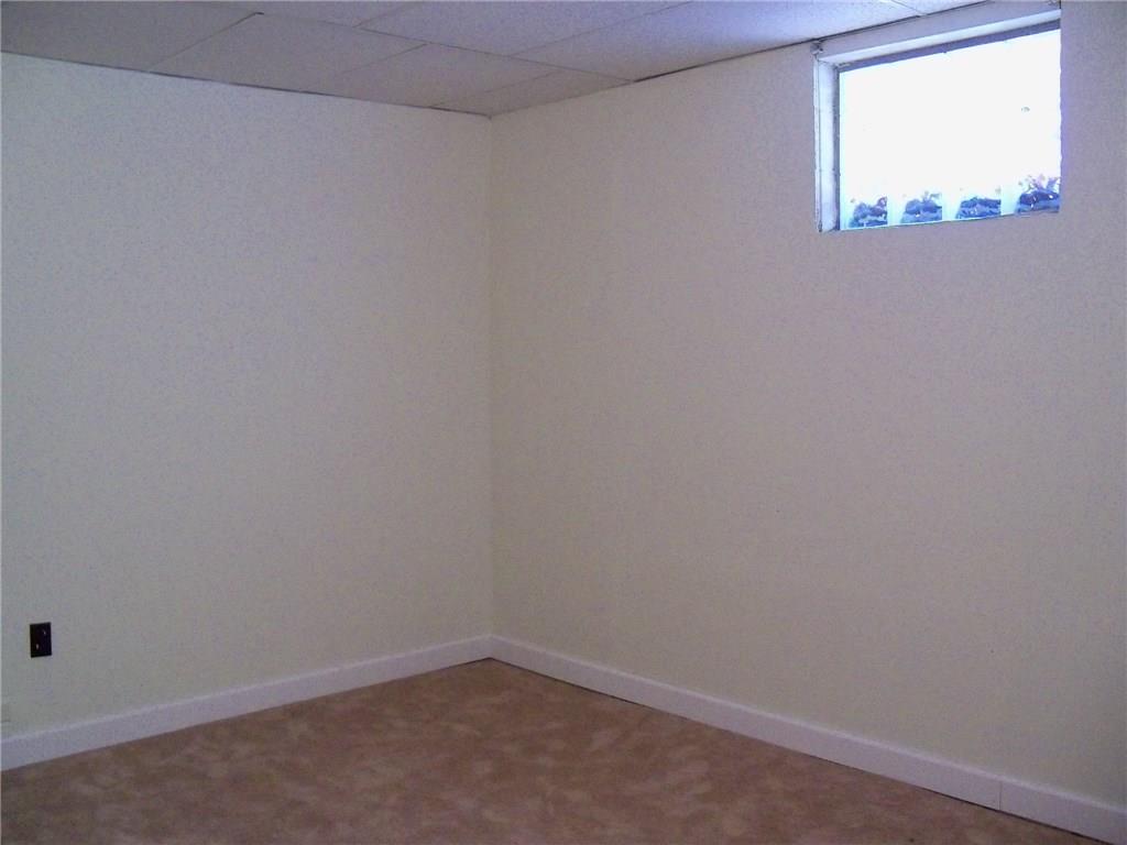3920 A Ridge Road Aliquippa, PA 15001 - Photo 19 of 25 Extra room in Lower level finished, freshly painted, new carpet, and new glass block window just recently installed