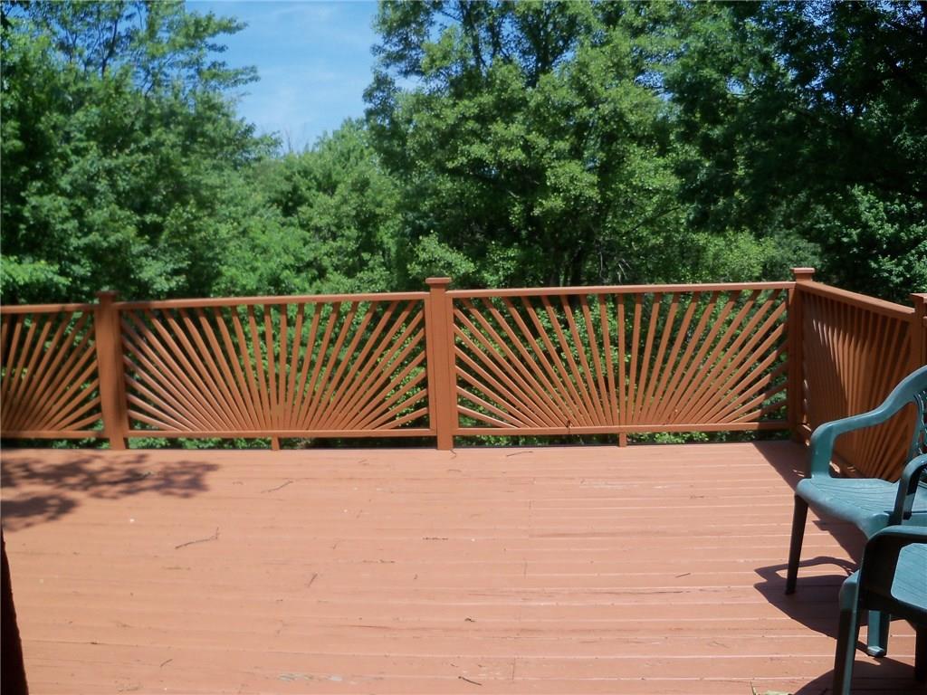 3920 A Ridge Road Aliquippa, PA 15001 - Photo 9 of 25 Huge Deck off the Dining room over looking the Private back yard and the pool