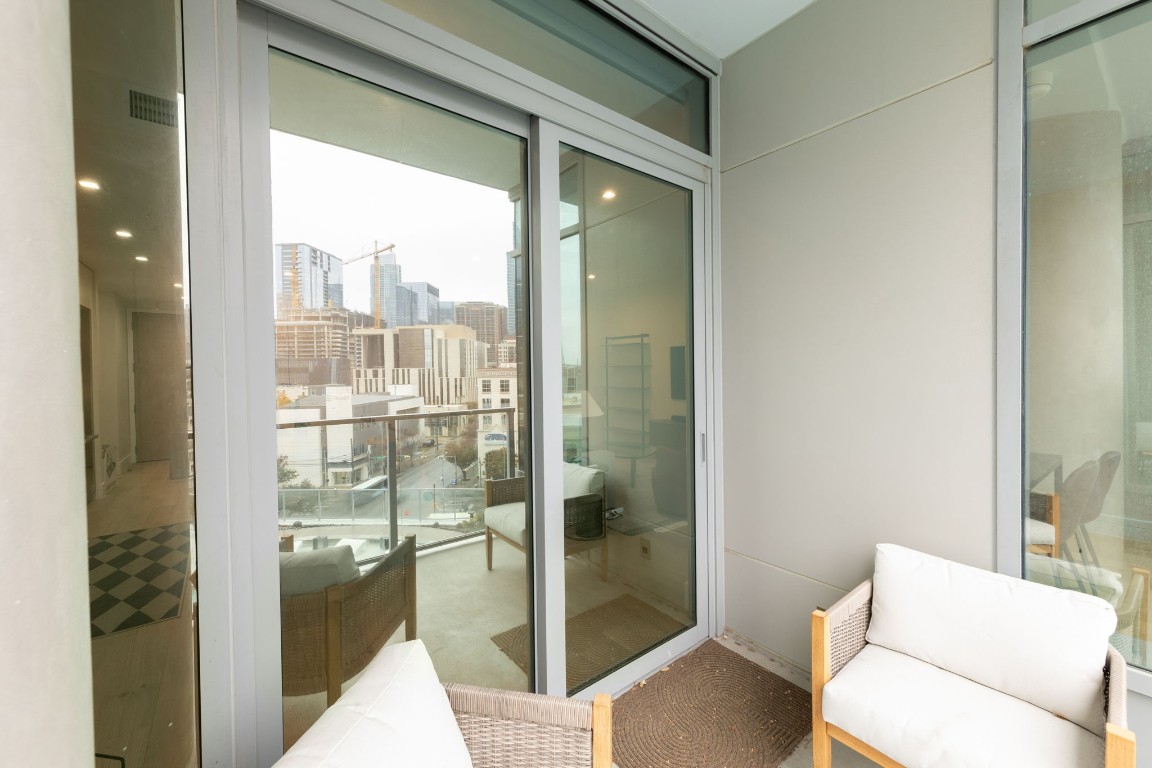 501 West Avenue, Unit 705 Austin, TX 78701 - Photo 13 of 33 a bathroom with a glass shower door
