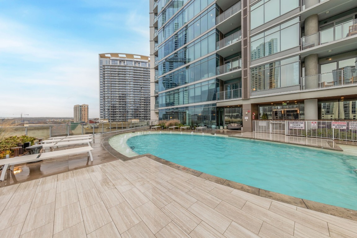 501 West Avenue, Unit 705 Austin, TX 78701 - Photo 19 of 33 a view of building with yard