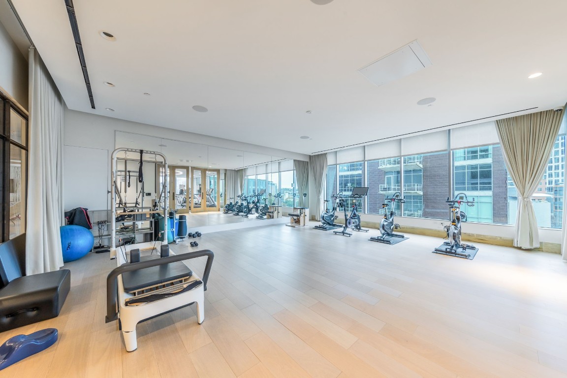 501 West Avenue, Unit 705 Austin, TX 78701 - Photo 28 of 33 a living room with furniture and a flat screen tv