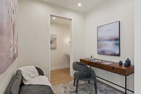 a room with furniture and a piano