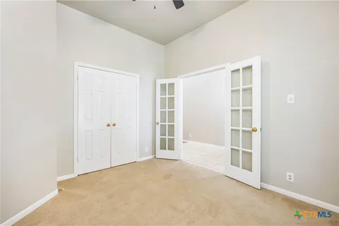 an empty room with windows