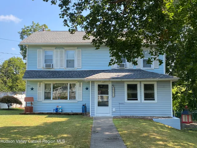 a view of a house with a swimming pool