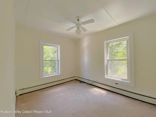 a view of a deck with a yard