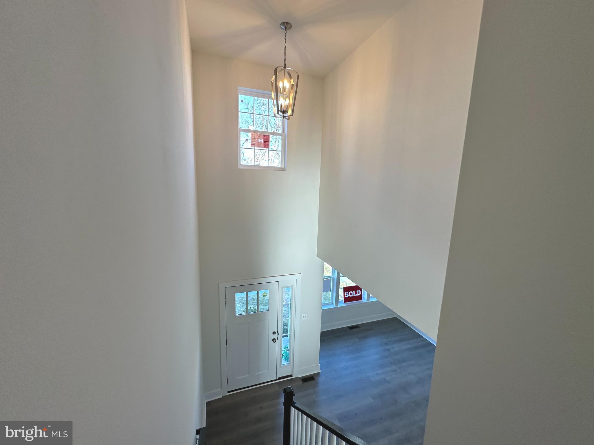 Arnold Road Glenville, PA 17329 - Photo 6 of 28 a view of a hallway with wooden floor and a window