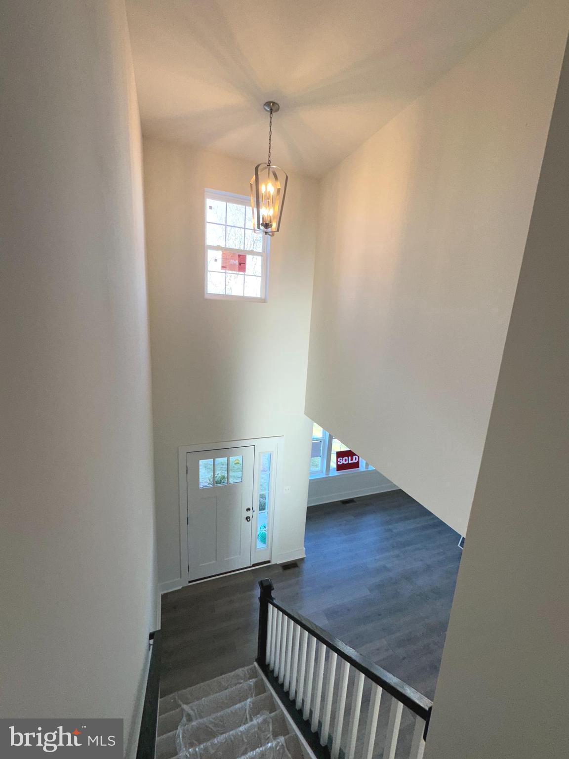 Arnold Road Glenville, PA 17329 - Photo 7 of 28 a view of a hallway with wooden floor and stairs