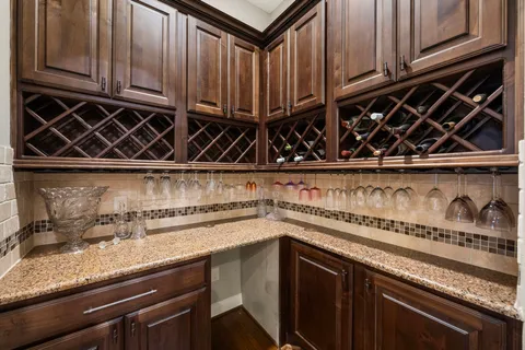 a kitchen with a stove and cabinets