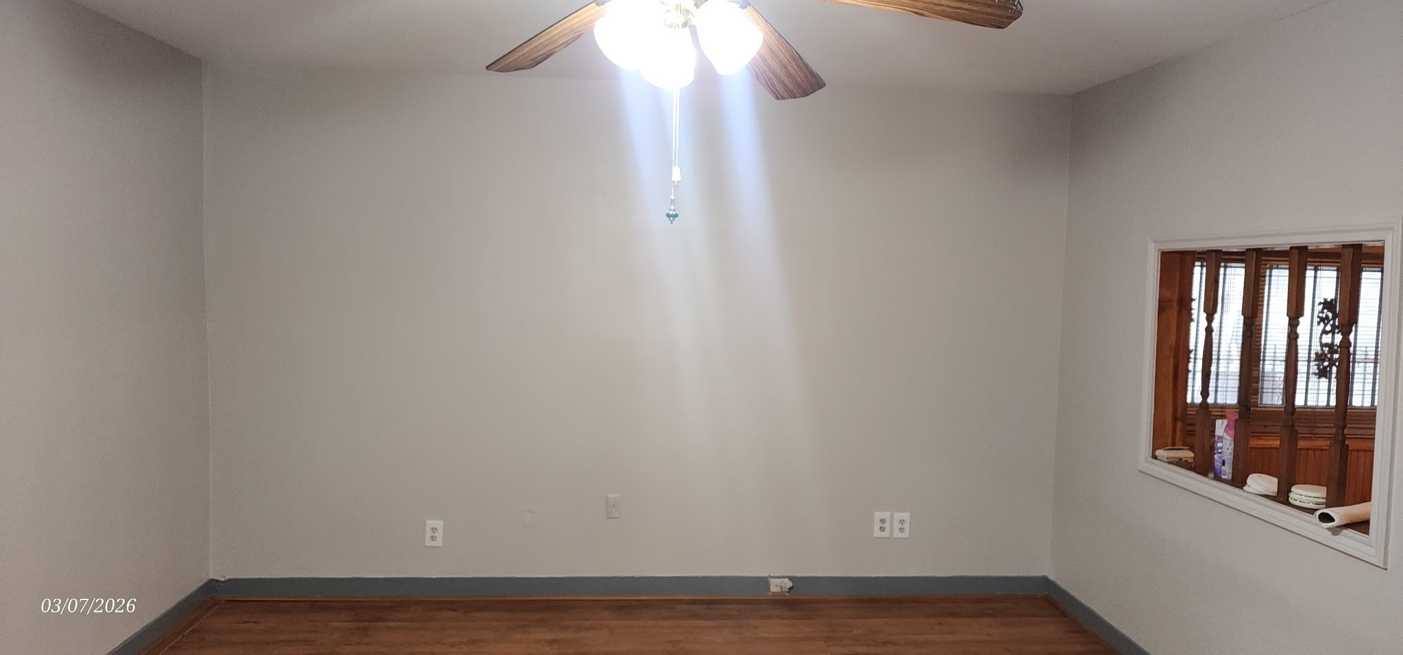 4612 Hain Street Houston, TX 77009 - Photo 17 of 21 a view of an empty room with wooden floor and a window