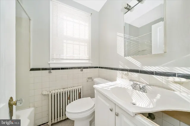 a kitchen with a stove and a refrigerator