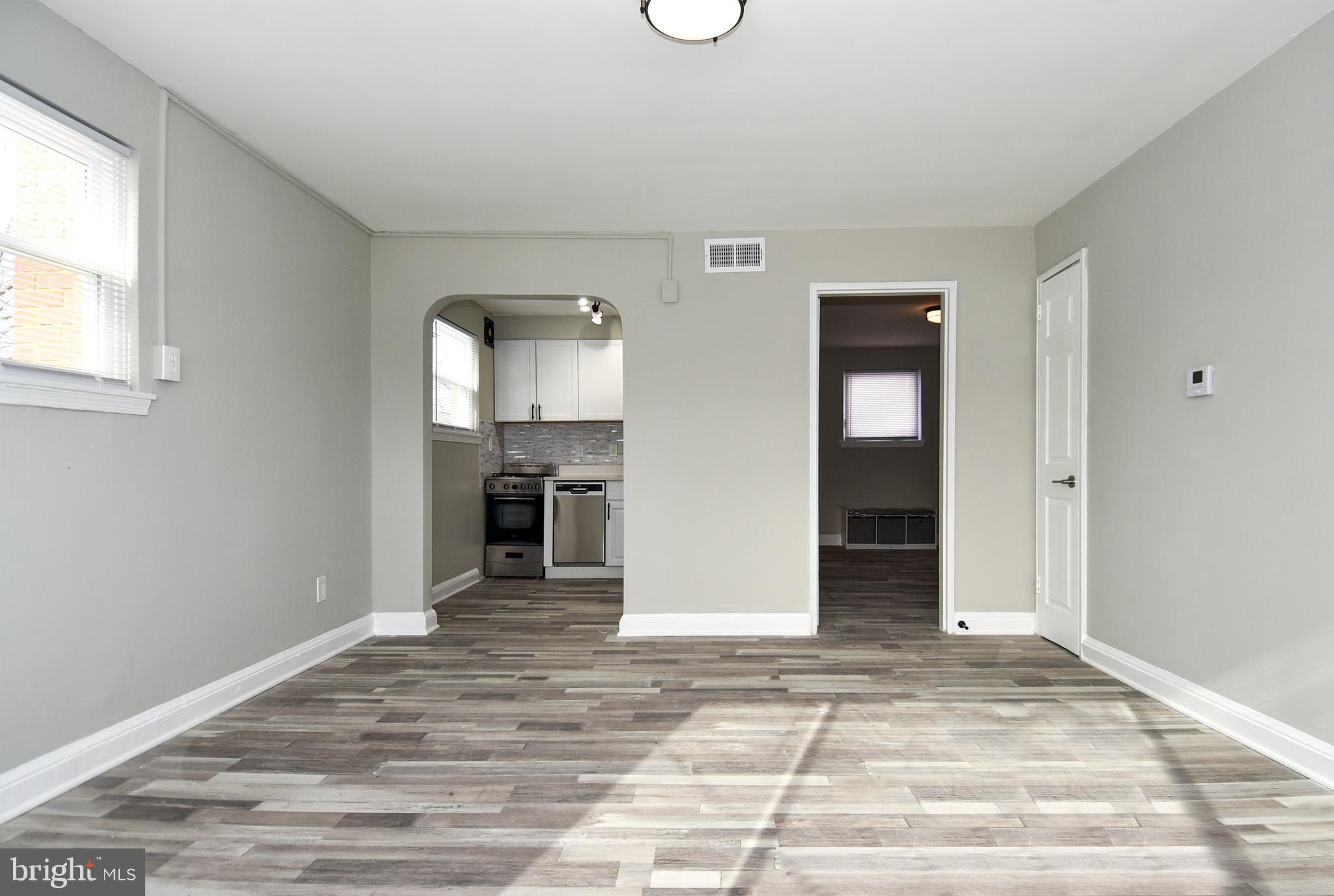 8208 Bellefonte Lane, Unit 3 Clinton, MD 20735 - Photo 17 of 38 a view of a kitchen with a sink and a window