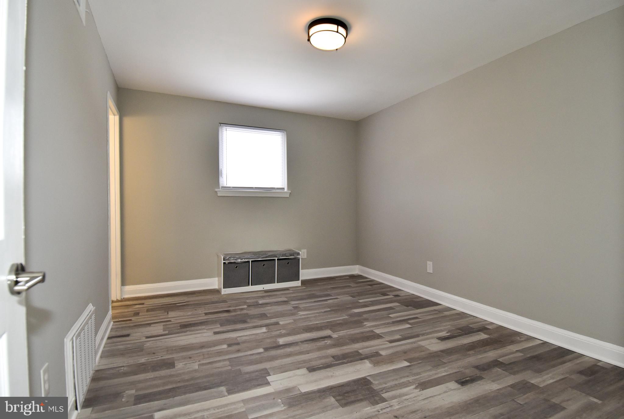 8208 Bellefonte Lane, Unit 3 Clinton, MD 20735 - Photo 21 of 38 a view of a livingroom with a hardwood